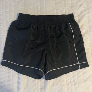 Black Fashion Nova Men’s athleisure shorts.